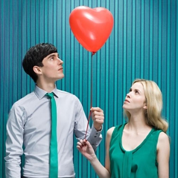 Couple with heart shape balloon