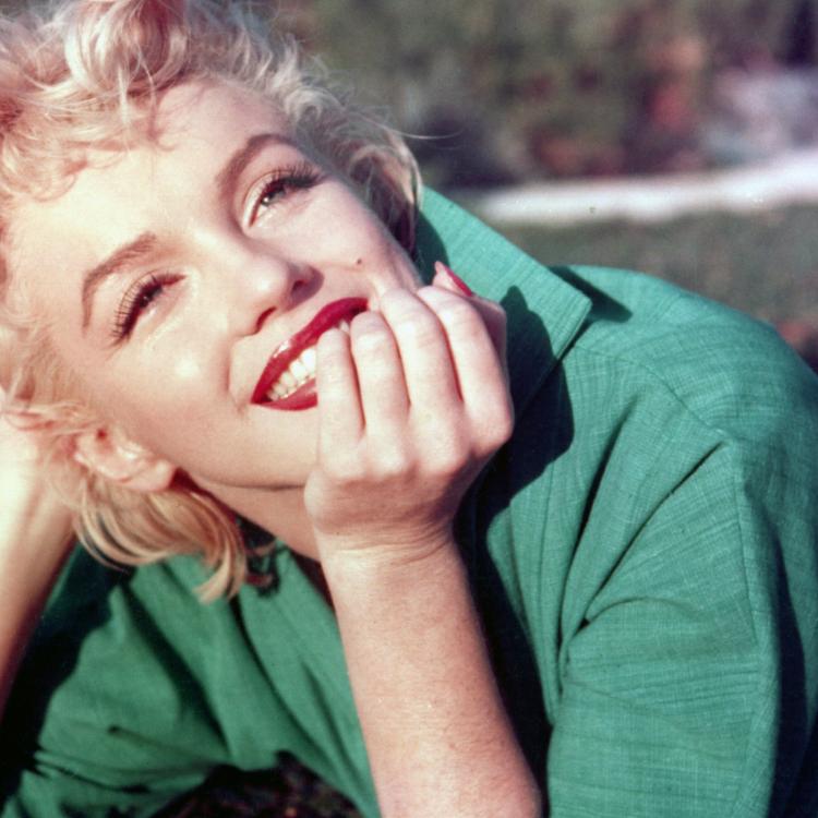 Znakami rozpoznawczymi Marilyn były blond włosy i mały pieprzyk. (Fot. Baron/Hulton Archive/Getty Images)