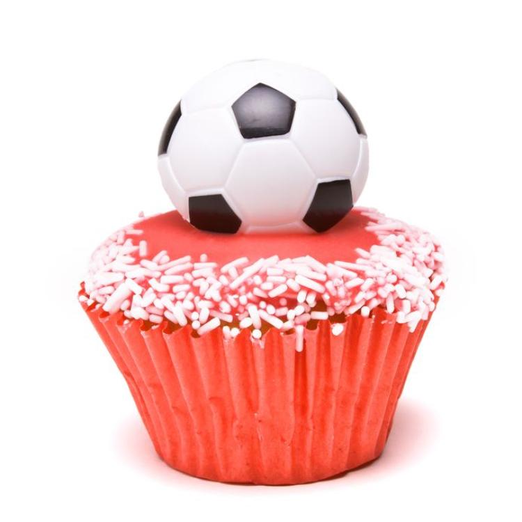 7153789 - soccer cup cake in the colours of england red and white for football supporters.